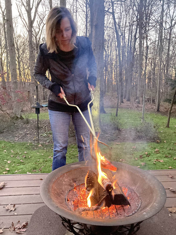 Karen tending fire